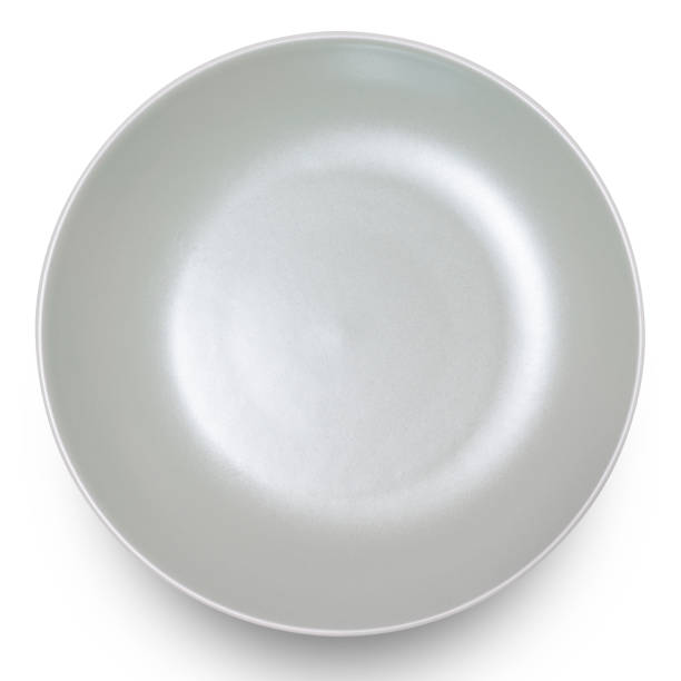 istock Grey circle ceramics plate isolated on white background. 1566215260