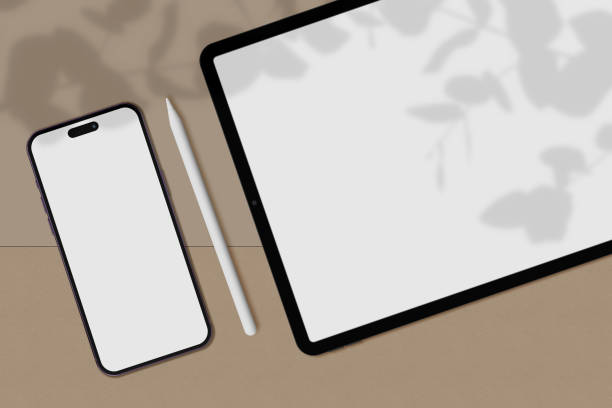 istock Realistic Smartphone, Tablet and Pencil Mockup Scene Creator with shadow overlay.Template for branding identity global business web site design app. 3D rendering 1566234643