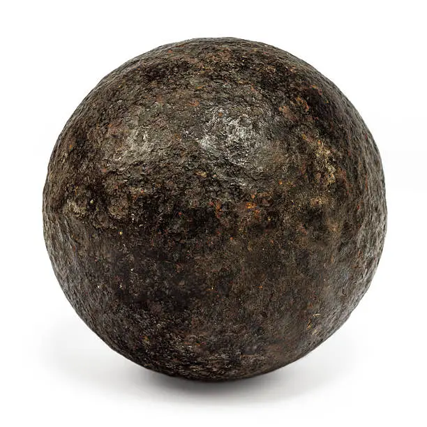 Genuine 18th century cannonball isolated on a white background