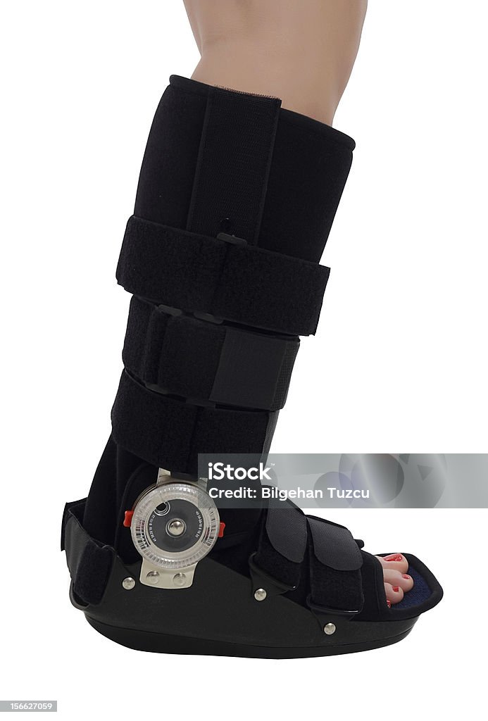 Mujer con ankke soporte - Foto de stock de Aparato ortopédico de pierna libre de derechos
