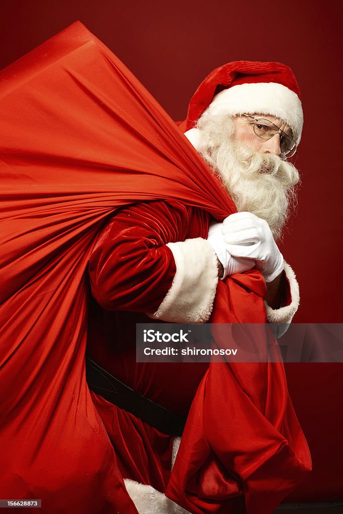 Heavy presentes - Foto de stock de Papai Noel royalty-free