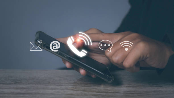 istock CONTACT US, Man using phone support hotline people connect customer service. 1566344280