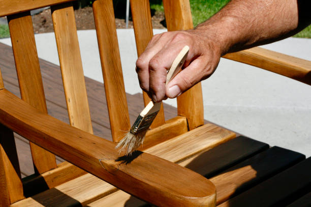 istock Staining Cedar Furniture 1566347613