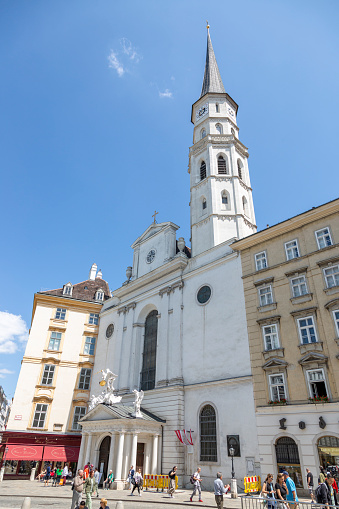 Vienna, Austria - June 13, 2023: St. Michael's Church on Michaelerplatz in Vienna