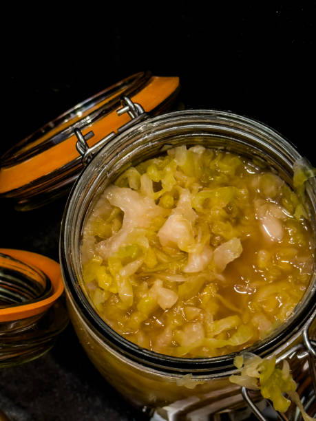istock Homemade Sauerkraut in Jar Top View 1566366968