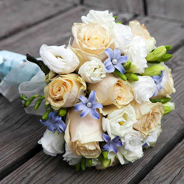 Wedding bouquet of yellow and white  roses stock photo