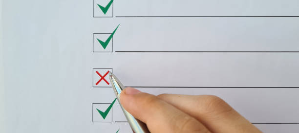 istock Hand drawn elements of check and cross sign exam test 1566486419