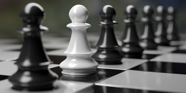 istock One white Chess pawn and black pawns on chessboard 1566492214