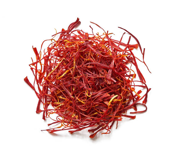 istock top view flat lay overhead red crocus sativus saffron spice isolated on white background. pile of red crocus sativus saffron spice isolated. heap of red crocus sativus saffron spice isolated 1566519066