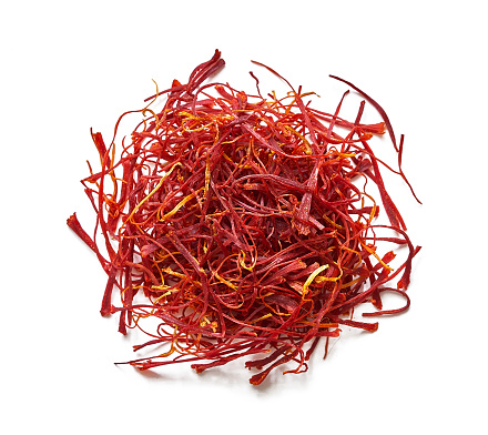 top view flat lay overhead red crocus sativus saffron spice isolated on white background. pile of red crocus sativus saffron spice isolated. heap of red crocus sativus saffron spice isolated