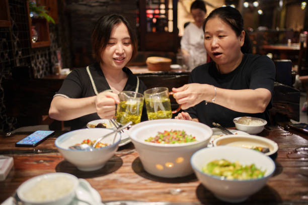 istock Two ladies dining together to celebrate 1566530840