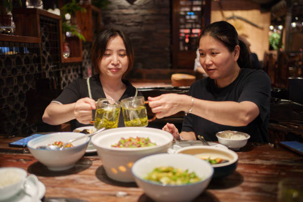 Two ladies dining together to celebrate