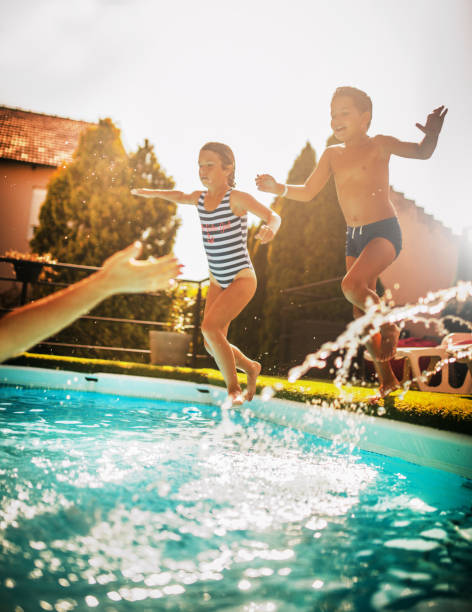 istock multi generation family enjoying at pool  party at home 1566564507