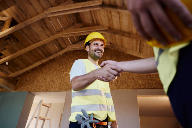 istock Successful deal at construction site! 1566583681