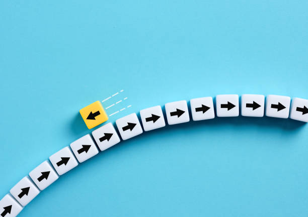 istock Going to the opposite direction. Standing out from the crowd. Difference, individuality and creativity. 1566590718