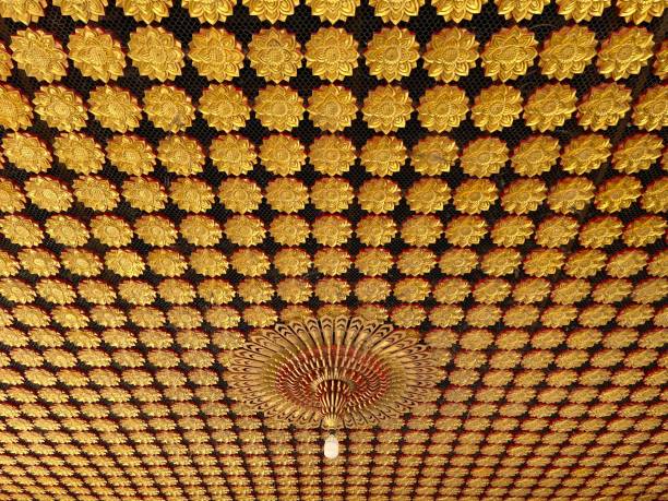 istock Golden ceiling decoration in the temple 1566597193