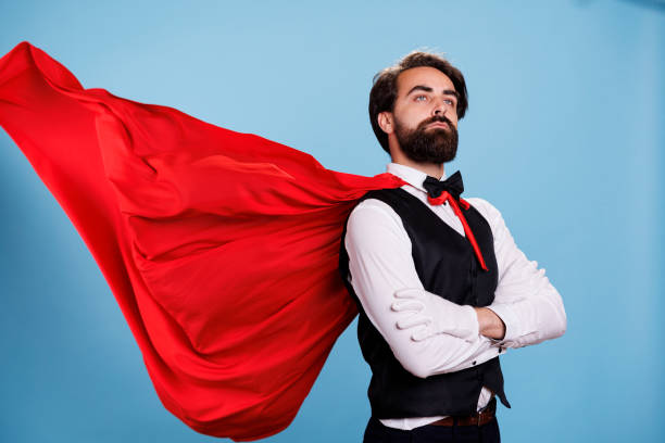 istock Strong man superhero with fantasy cape 1566619750