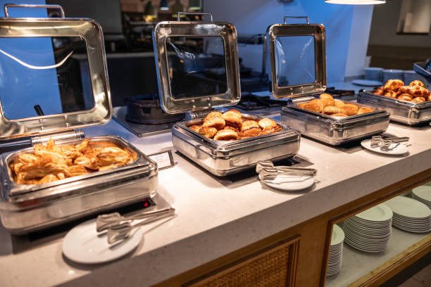 istock A buffet counter with fresh pastries in the hotel restaurant with a breakfast menu. 1566634700