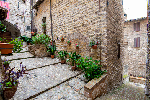 Stone well in a courtyard in Tuscany, Italy