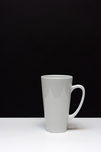 White big empty mug on a black and white background