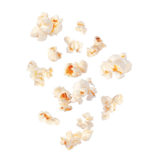 istock Fluffy popcorn scattered in the air closeup isolated on white background 1566671466