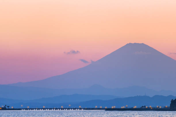 istock Twilight Tranquility: Mount Fuji View from Kanagawa Coastline 1566677762