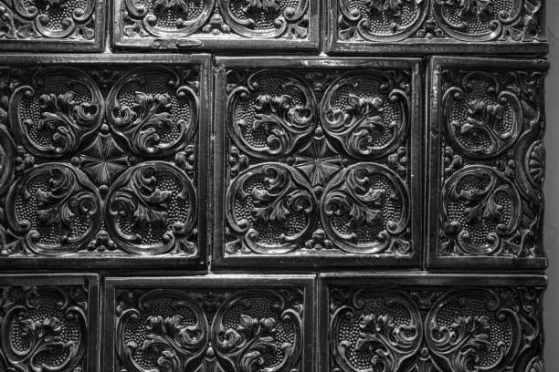 Closeup of ancient decorated furnace tile for design purpose