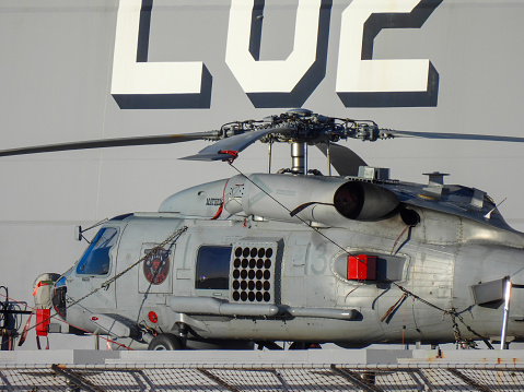 Navy ship in the port, background with copy space, full frame horizontal composition