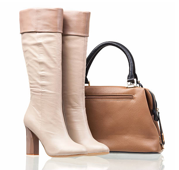istock Women high-heeled boots and leather bag 156675368