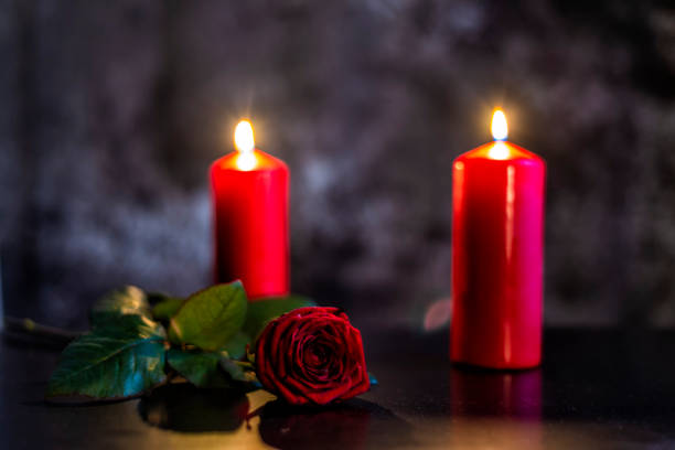 istock red rose and candles on Valentine's day 1566754271