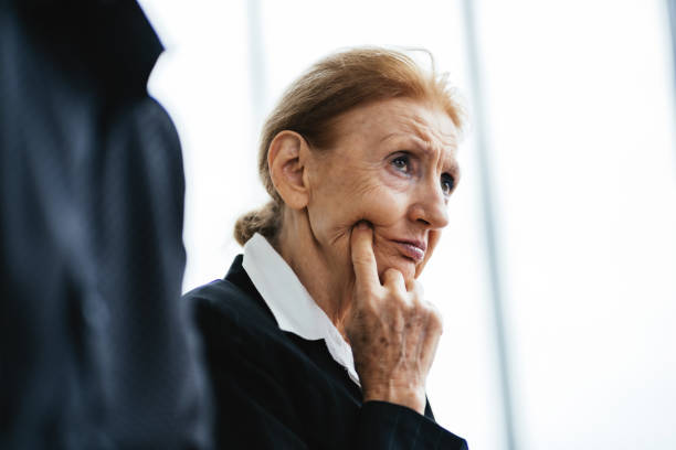 istock Mature woman worry about something 1566774864