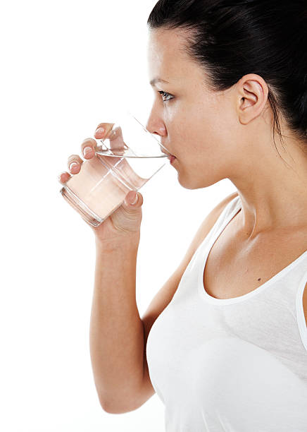 istock Beautiful healthy girl drinking water 156677643