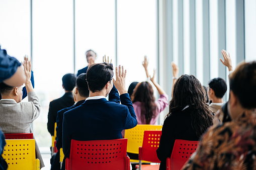 Diverse group of businesspeople planning new gainful activity post pandemic reality