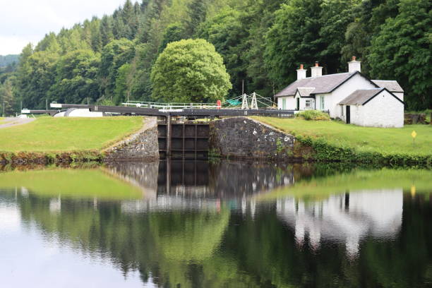 istock Locks along a canal in summer 1566792164