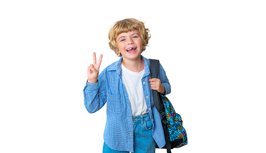 Primary school smiling boy girl PNG Isolated with backpack showing victory peace sign smiling at camera. Copy space for advertising blank concept. Back to school. Childhood, education, products for children