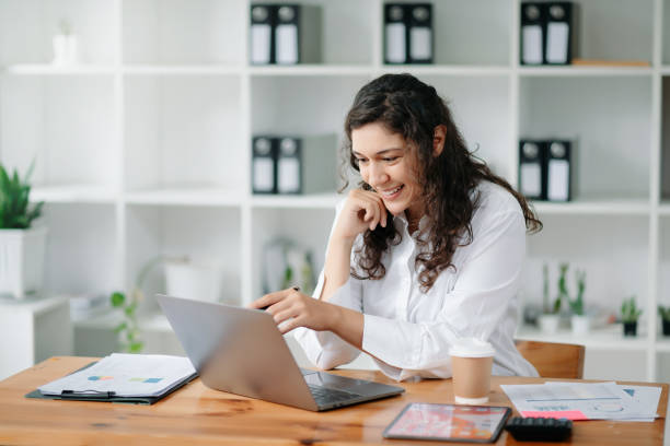 istock businesswoman working in the office with working notepad, tablet and laptop documents 1566813061
