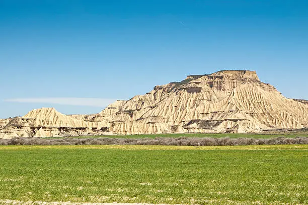 Semi-desert landscape in Bardenas Reales, Navarre, Spain. The Bardenas Reales is a semi-desert natural region, or badlands, in southeast Navarre, Spain 