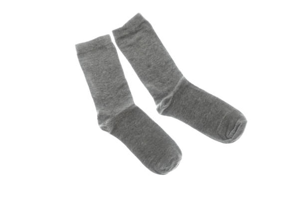 istock Grey cotton socks isolated on white 1566827195