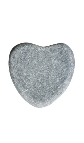 istock Grey stone in heart shape isolated on white background 1566827197