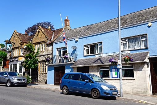 The Choughs pub and hotel and Conservative Club along the High Street, Chard, Somerset, UK, Europe.
