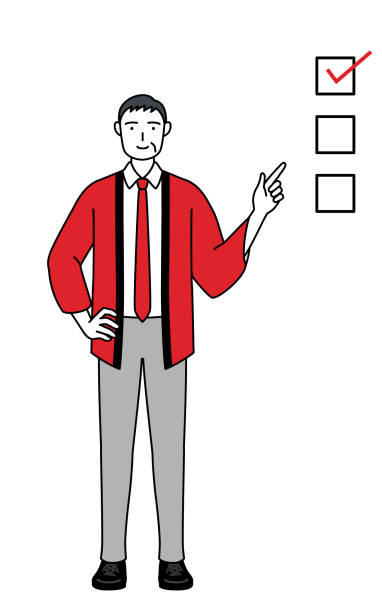 istock Senior man wearing a red happi coat pointing to a checklist. 1566857347