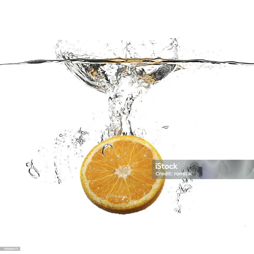 orange et eau splash - Photo de Agrume libre de droits