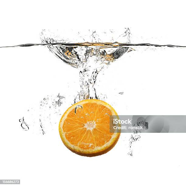 Photo libre de droit de Orange Et Eau Splash banque d'images et plus d'images libres de droit de Agrume - Agrume, Aliment, Aliments et boissons