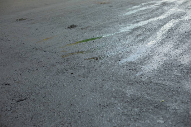 istock Black asphalt. New pavement. Texture of asphalt. 1566864783