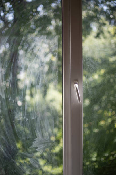 istock Window in room. Light on glass. White window of house. 1566869621