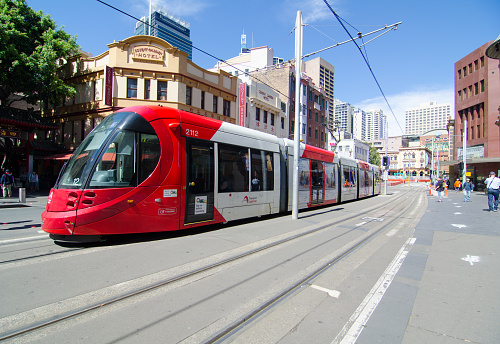 SYDNEY, AUSTRALIA. – On December 5, 2017. – Red light rail running through Market city at Sydney Chinatown.
