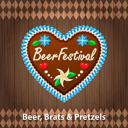 An invitation for the Beer Festival with heart shaped ginger cookie on the background of wood and blue checked pattern