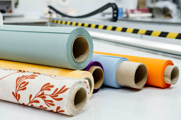 istock Rolls of fabric for roller blinds are in production 1566880551