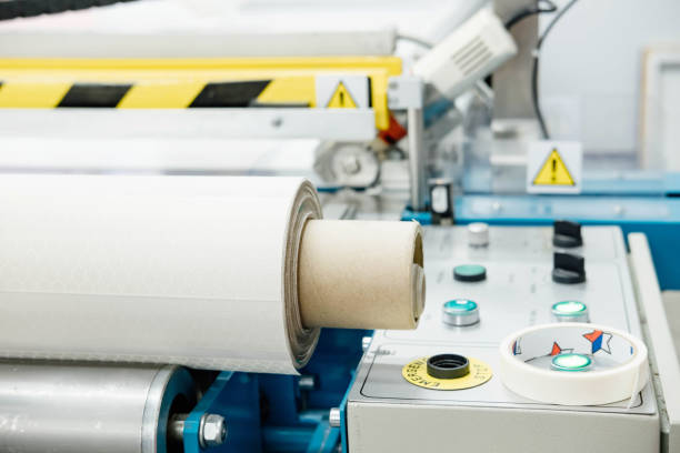istock Rolls of fabric for roller blinds are in production 1566881012