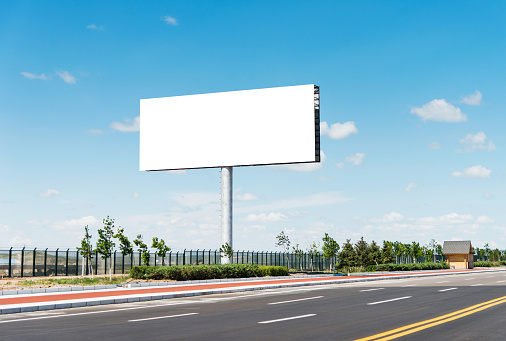 Blank billboard by the highway.